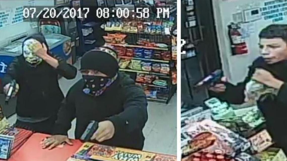 Police are seeking two armed robbers, one who was caught on camera with his mask down, in a string of holdups.