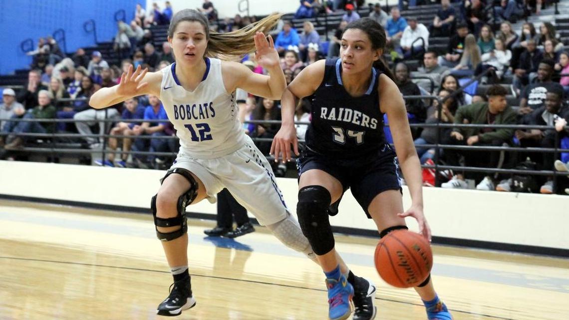 Lexi Gordon (34) drives past a Trophy Club Nelson defender