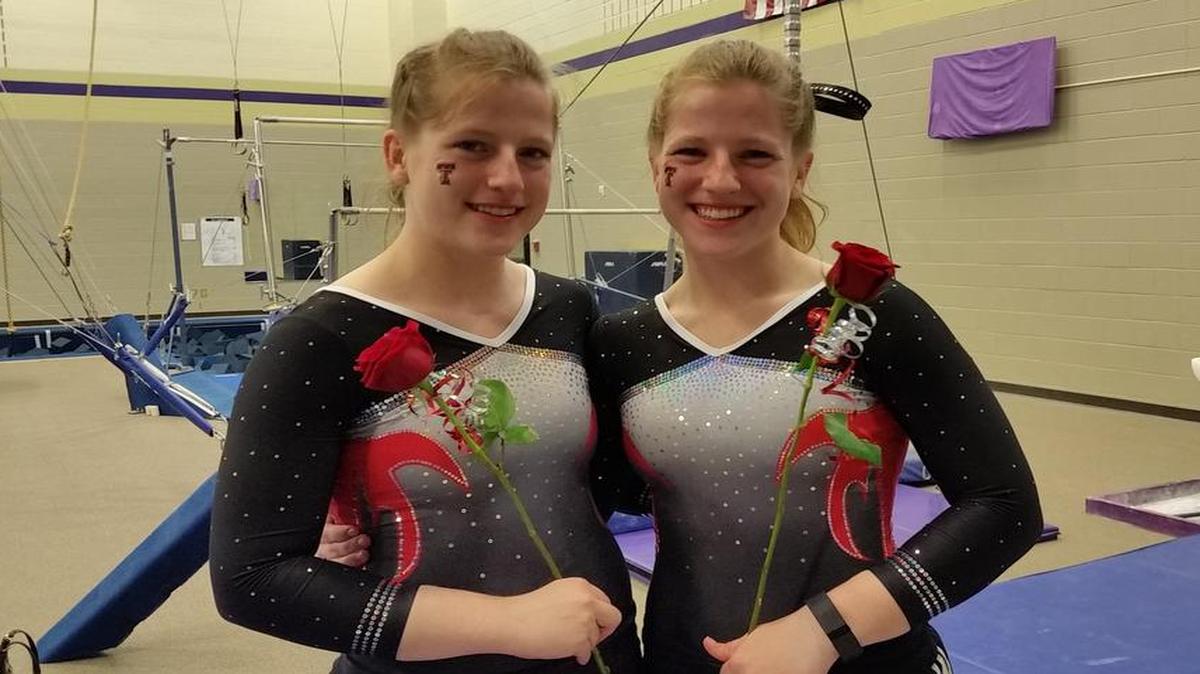 Holly, left, and Hailey Jarzynka at the state meet earlier this year.