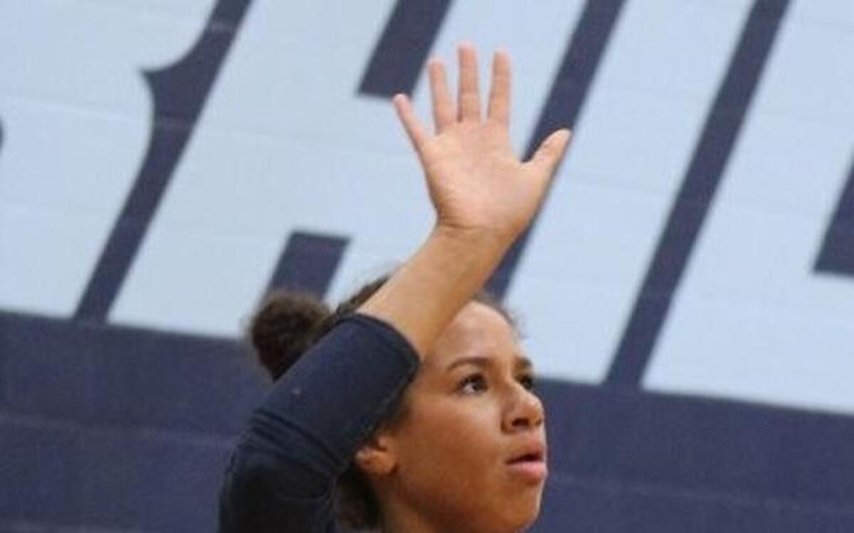 Lezlee Dixon originally played basketball but gravitated to volleyball when she entered L.D. Bell.