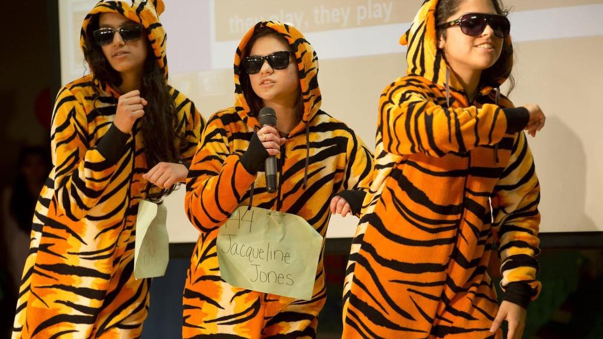 Namibia Malhotra, Jacqueline Jones, and Diana Ivanna Coty perform a song: Three Tigers.