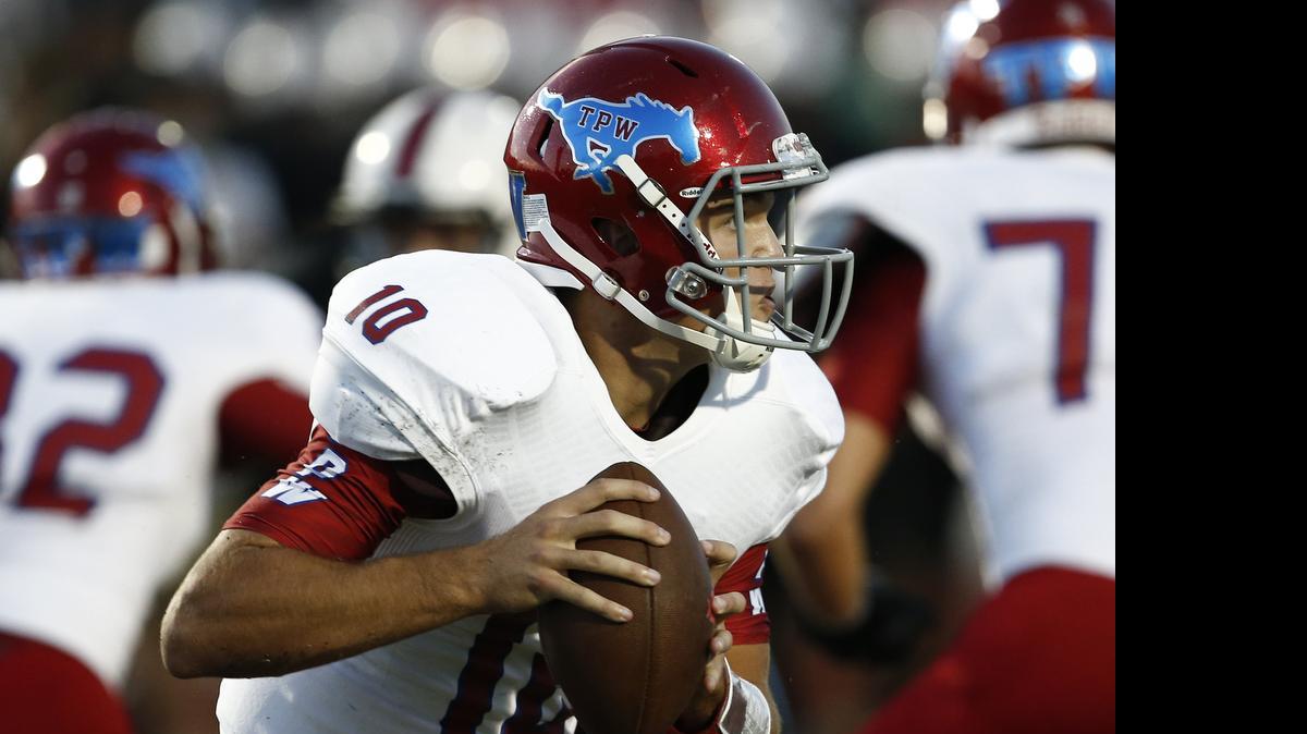 
Grapevine quarterback Sam Barry (10) missed most of his senior football season but made up for it in track.
