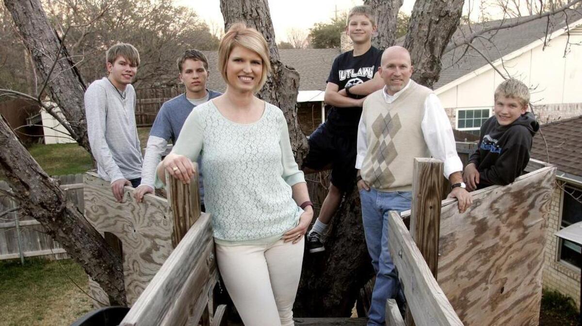 Trasa Cobern, whose father stars as Uncle Si in the well-known reality show Duck Dynasty, was easily elected Saturday to the Hurst City Council. She is shown with her husband, Kyle, and sons Brady, Caden, McCrae and Jaxon on Feb. 17.
