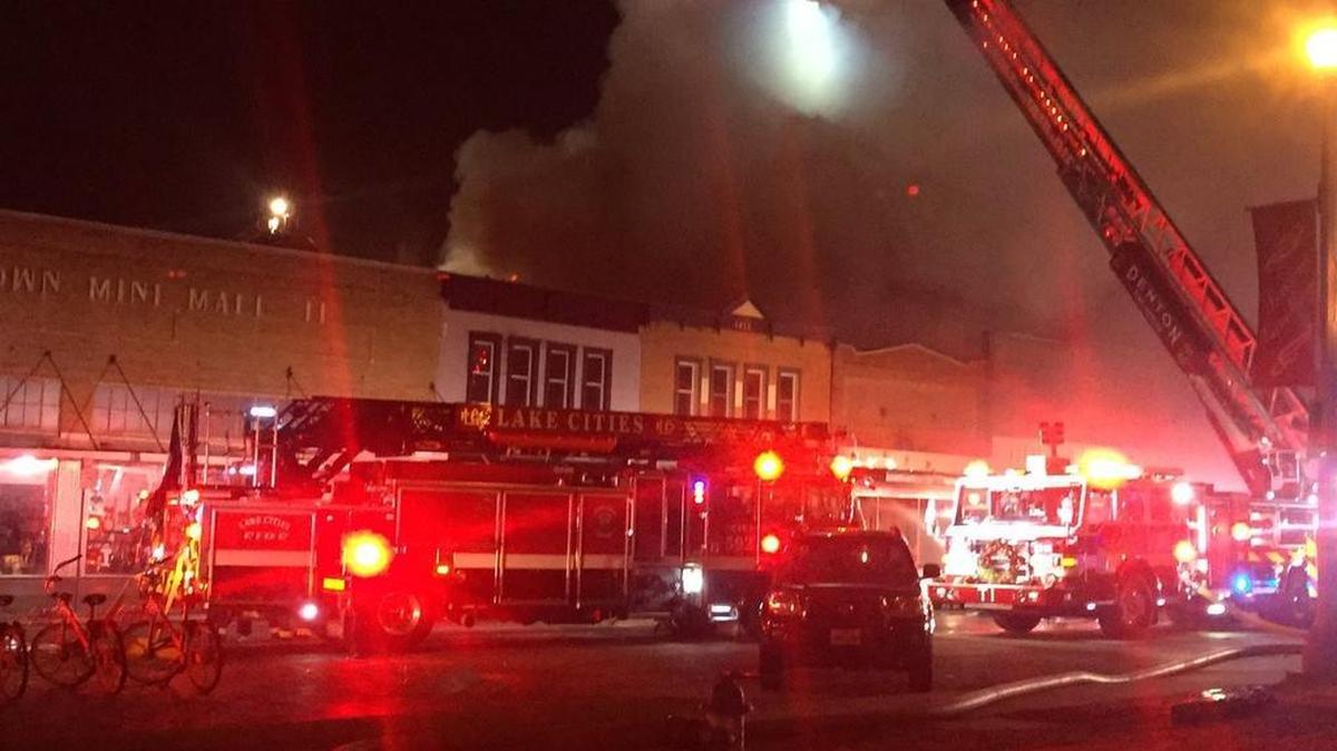 A section of the Mini Mall on the historic Denton square was destroyed by fire late Monday.