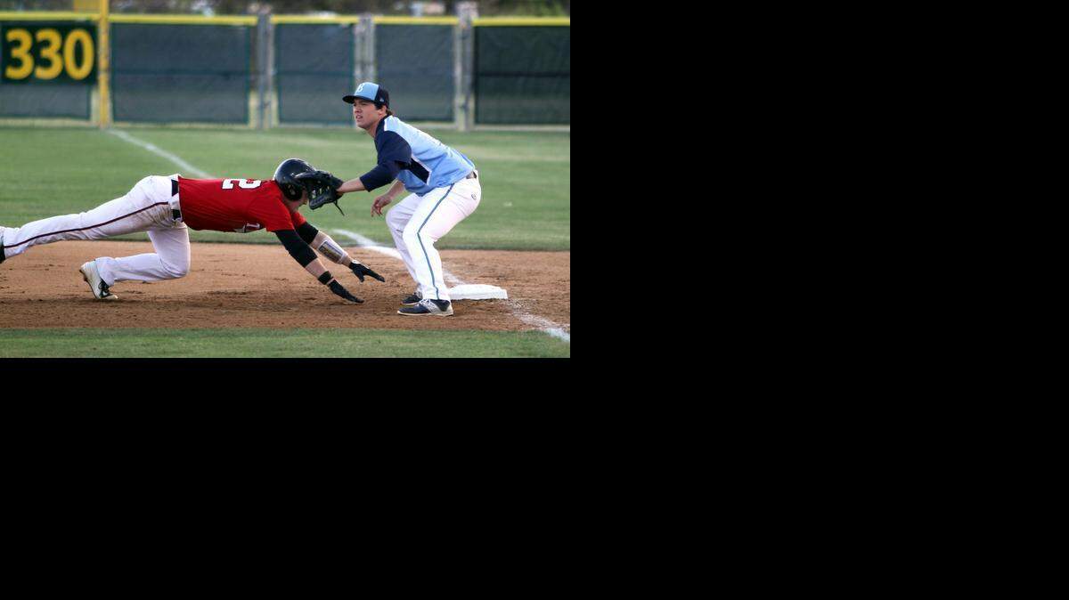 
L.D. Bell first baseman Preston Newman waits for a pick-off throw last Friday against Trinity.
