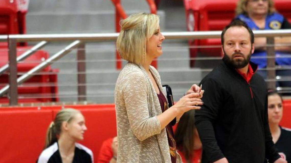 Jamie Siegel, center, coaches Colleyville Heritage in the 2013 playoffs.