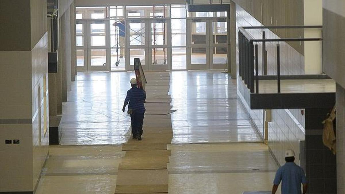 Large windows at either end of the main corridor and clerestory windows along the ceiling provide ample light but not good shelter during severe weather. School officials had to find rooms with no windows to designate as “safe rooms” during tornadoes.