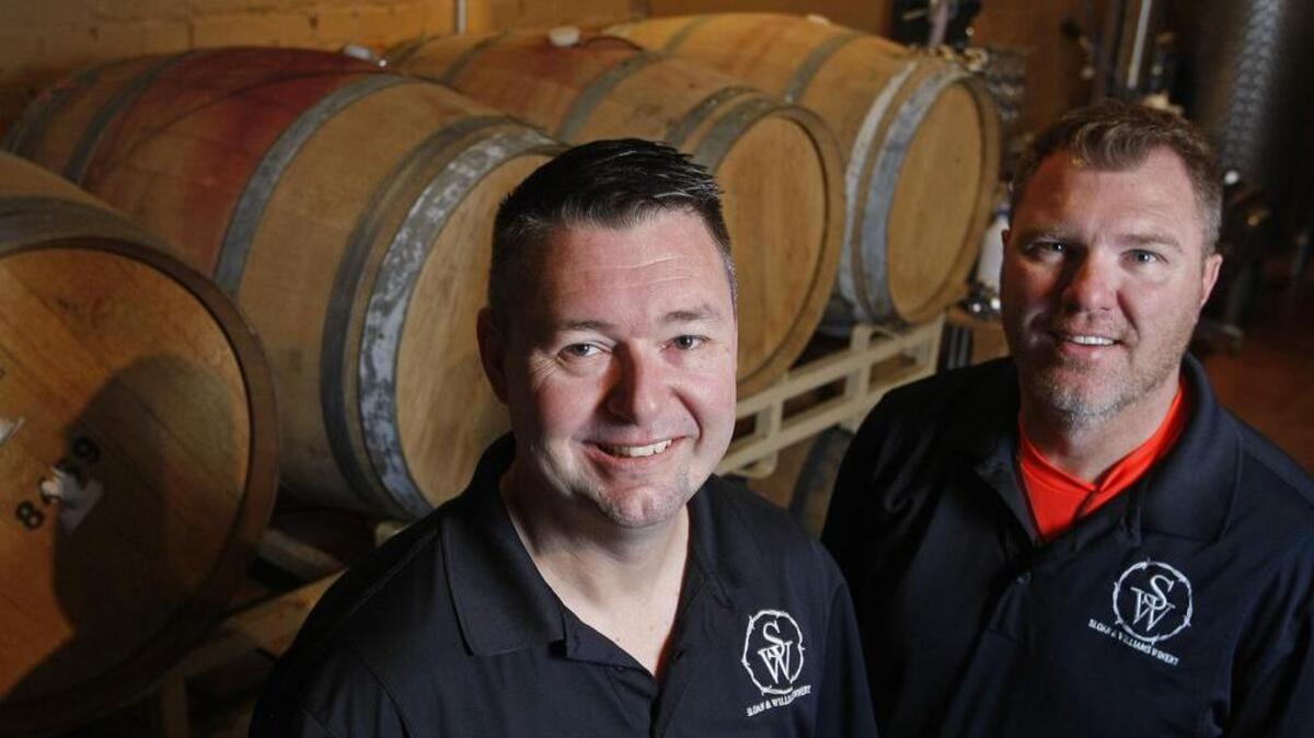 
Alan William Kunst Jr., left, and Ralph Mattison Jr. are the co-owners of Sloan & Willliams Winery in Grapevine. Kunst calls Grapevine the “Super Bowl” of the wine world.
