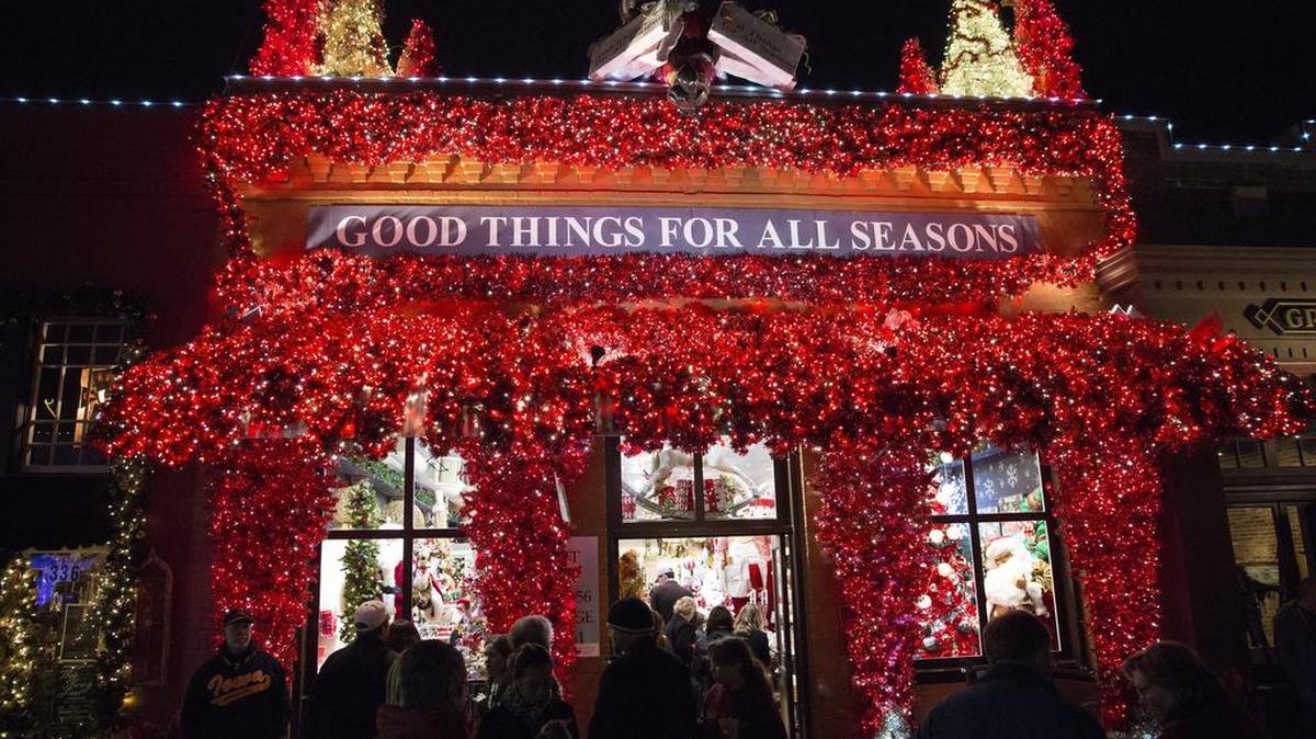 A holiday store in Grapevine is adorned with red and white lights.