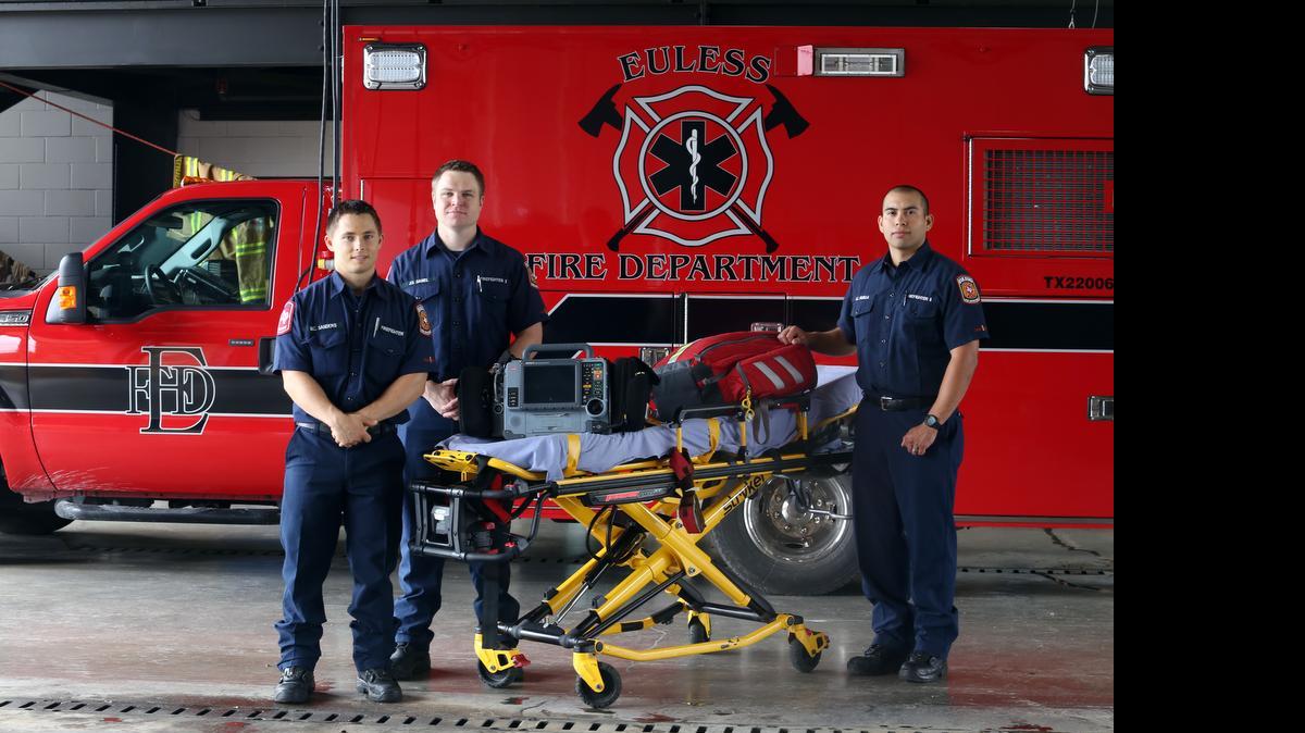
Firefighters/Paramedics from left, Matt Sanders, Joel Daniel and Saul Padilla are photographed at Euless Fire Department's Station 3 in Euless,TX on May 29, 2015. The Euless Fire Department was recently given the Mission Lifeline award by the American Heart Association for their efforts in starting treatment on heart patients while communicating to the hospital during transport. 
