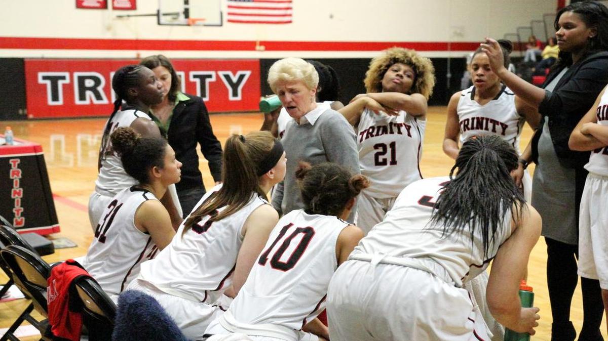 Trinity coach Sue Cannon, center, registered the 1,100th victory of her career last week.