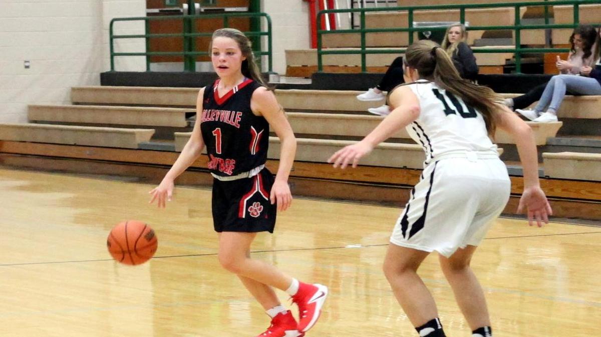 Colleyville Heritage will need McKinley Charles, left, to take advantage of her hot 3-point shooting in the playoffs.