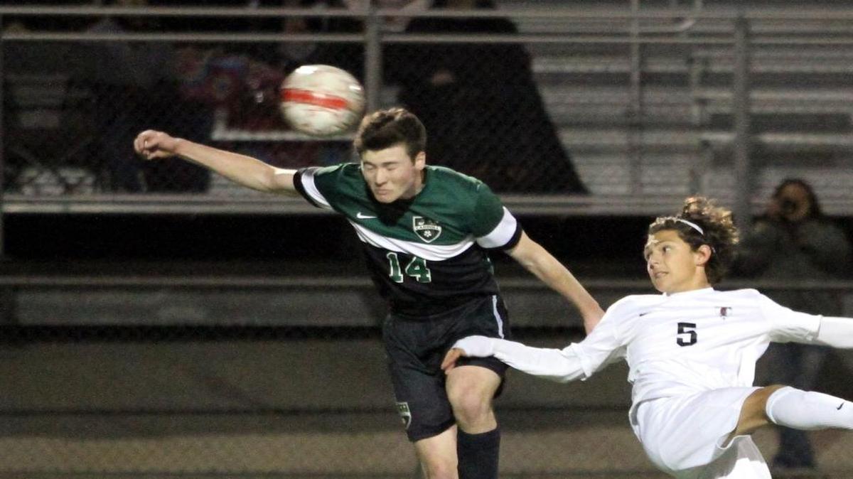 Cole O’Haugherty (14) and the Dragons will host a major district foe Friday in Flower Mound Marcus.