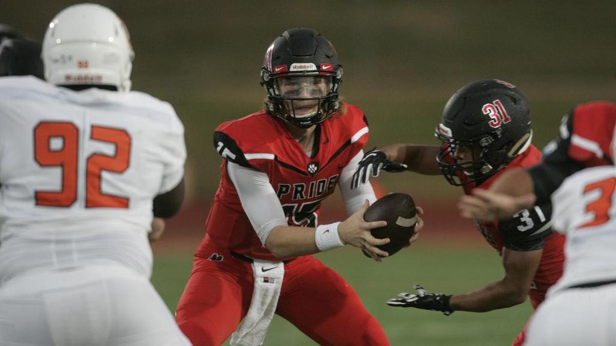 Cam Roane (15) had 323 yards and four touchdowns against Aledo in a loss.