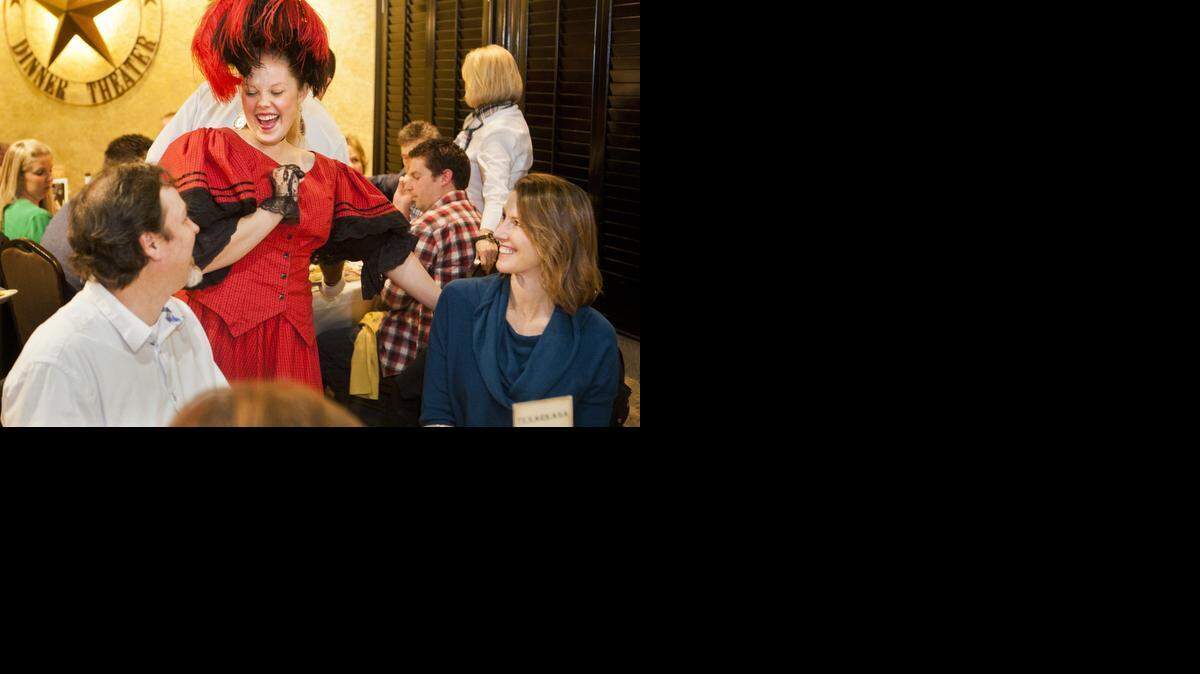 
Ashley Markgraf, as Holly, mingles with Alex and Catherine Meldrum.
