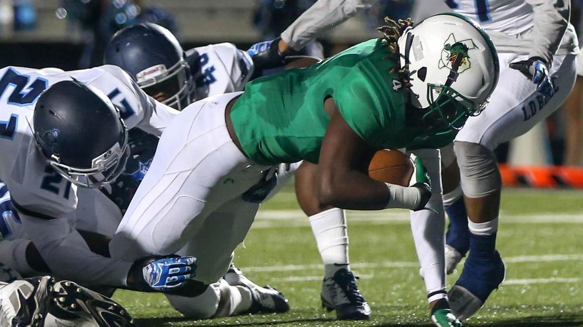 Southlake Carroll RB Lil' Jordan Humphrey (4) goes in for a touchdown run against L.D. Bell.