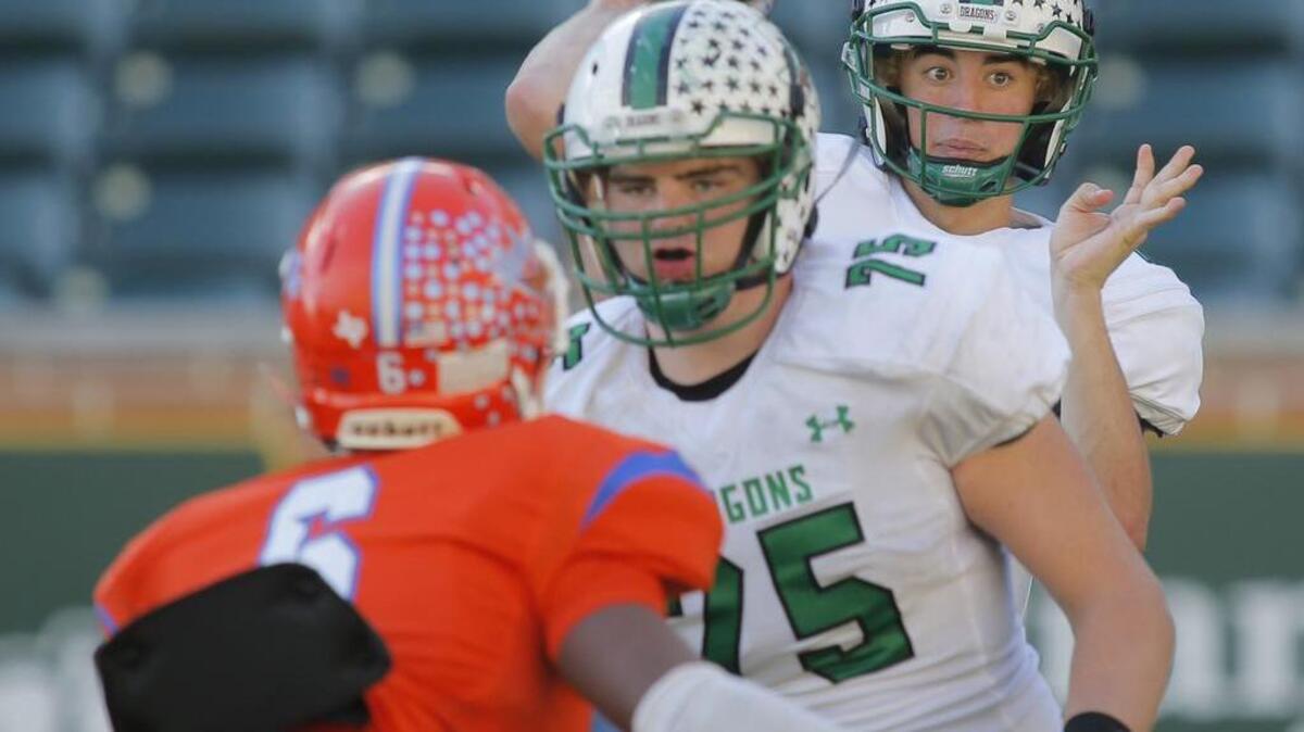 
Lucas Tribble (75) protects Ryan Agnew last season.

