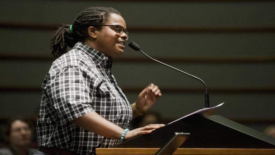 
Ailey Pope, 24, of Dallas, speaks to the Grapevine City Council Tuesday night, asking city officials to release the dash-cam video of the fatal shooting of an unarmed man by a Grapevine police officer on Feb. 20
