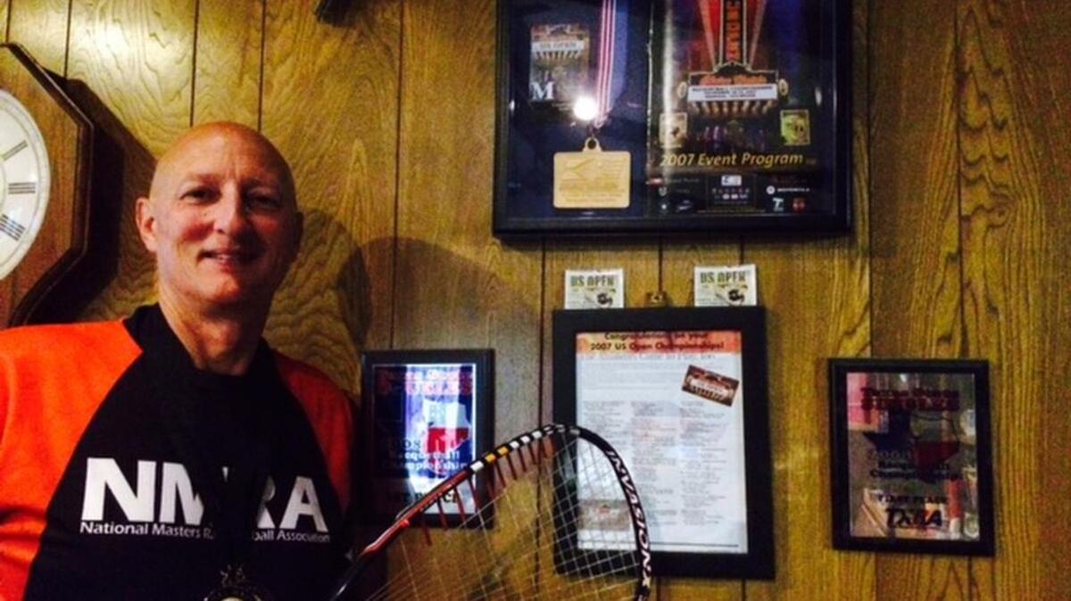 
Hurst resident Patrick Gibson with some of his racquetball medals and memorabilia
