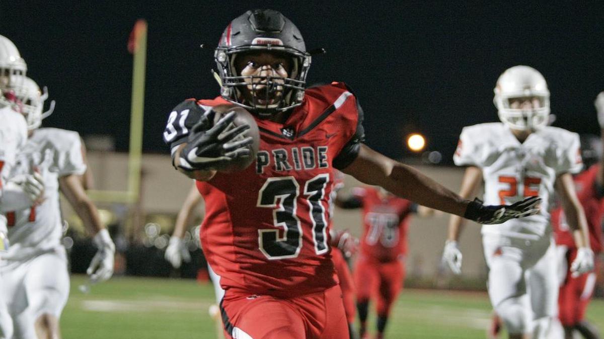 Heritage running back Mario Ortiz (31) scores a touchdown against Aledo in the Panthers’ season opener.