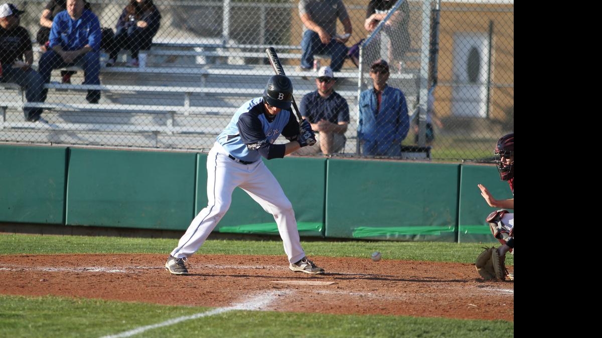 
Bell outfielder Mason Peterson watches a low pitch. The senior-to-be is looking to come back strong from an arm injury suffered several months ago.
