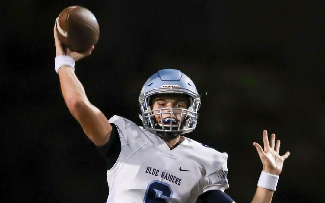 L.D. Bell QB Austin Brougham looks to pass against Flower Mound Marcus in recent play.