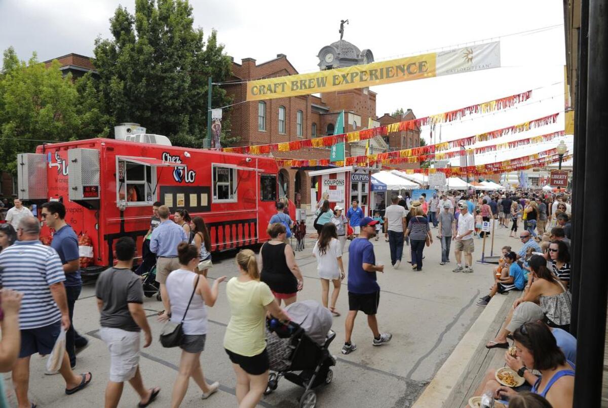 The crowd wanders among the vendors at Grapevine’s 32nd Annual Main Street Fest A Craft Brew Experience.