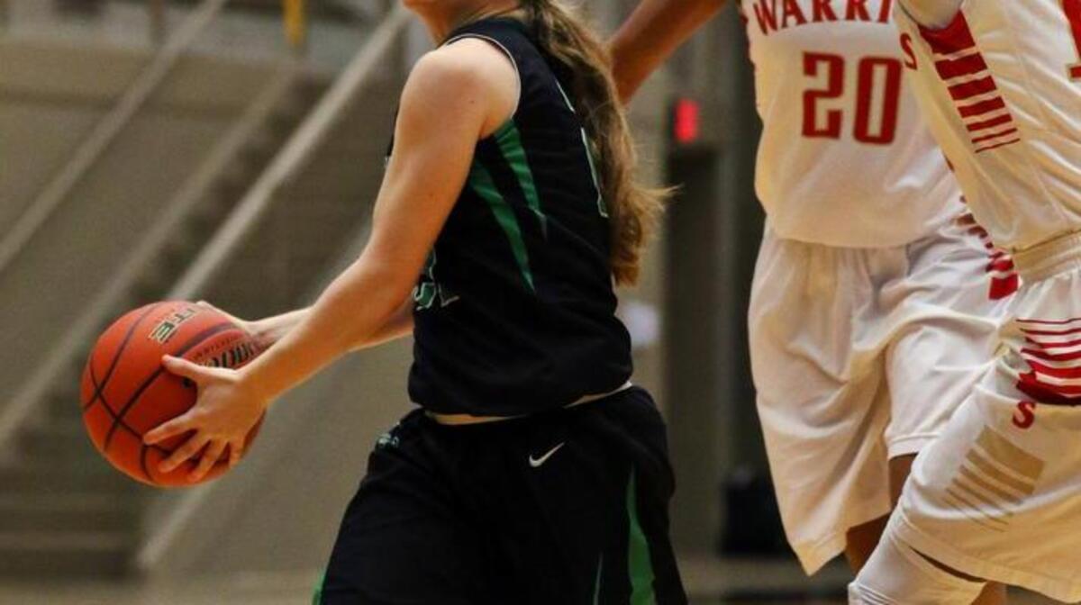 Carroll’s Brooke Lay (21) has taken over as point guard this season.