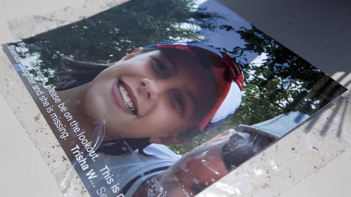 A photograph of Kaytlynn Cargill was put up in the dog park of her family’s Bedford apartment complex in the days after she was reported missing.