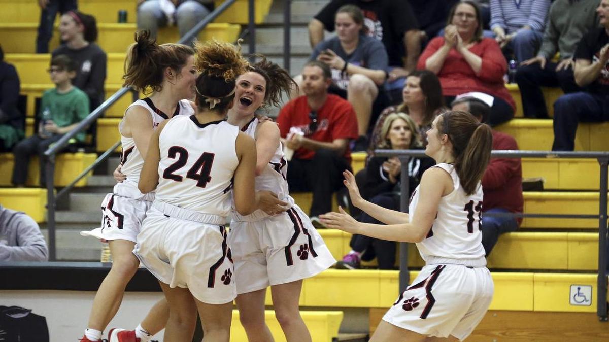 Colleyville Heritage players celebrate their win over Aledo in the area round of the playoffs.
