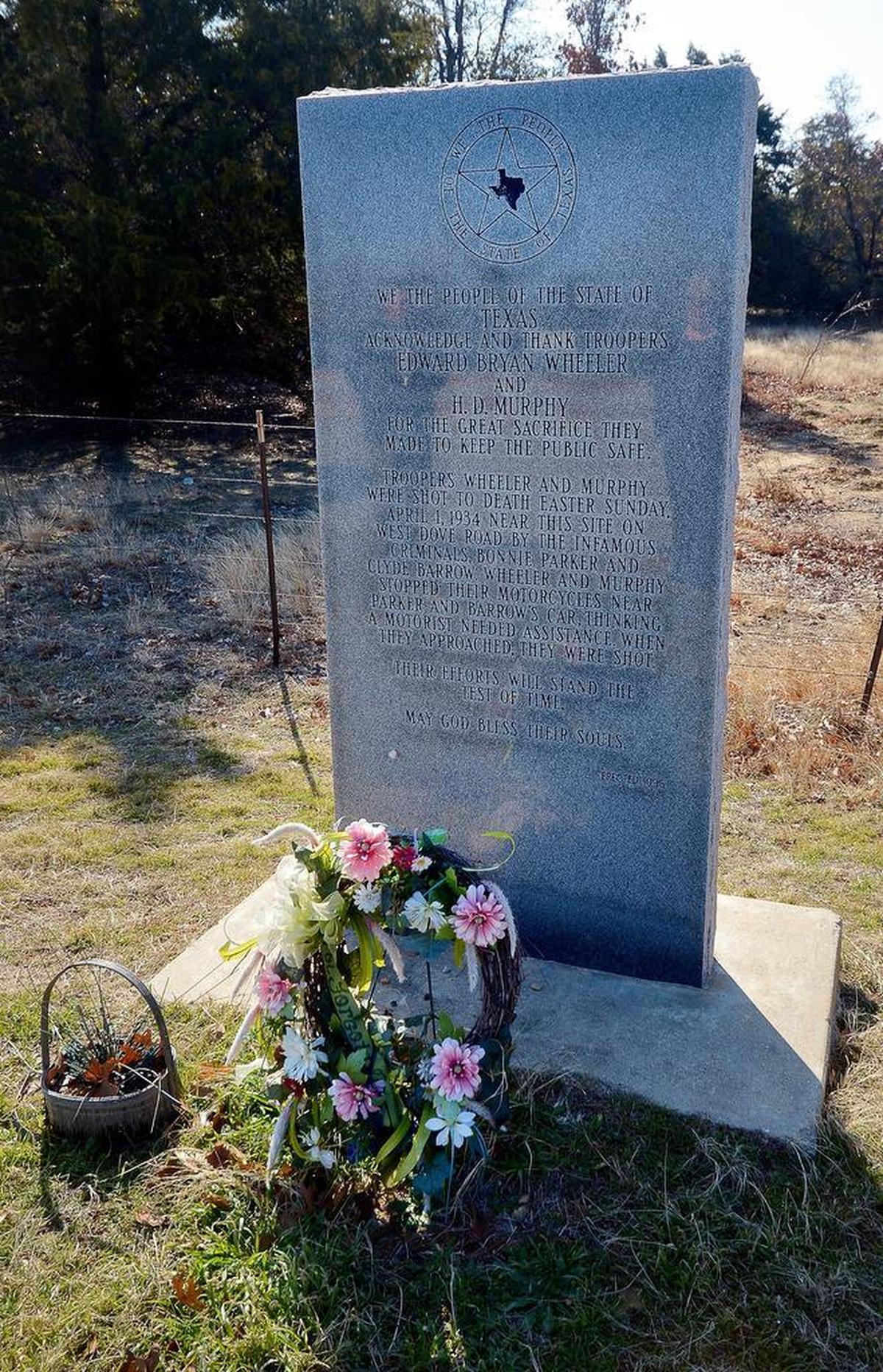 A marker on Dove Road near Texas 114 is a monument to Texas state troopers Edward Bryan Wheeler and H.D. Murphy, both who gunned down by Bonnie Parker and Clyde Barrow.