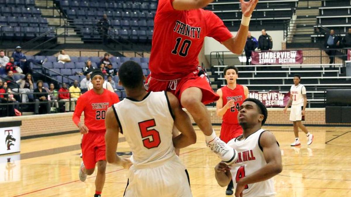 The Trinity boys basketball team is dealing with the indefinite absence of Jhivvan Jackson (10).