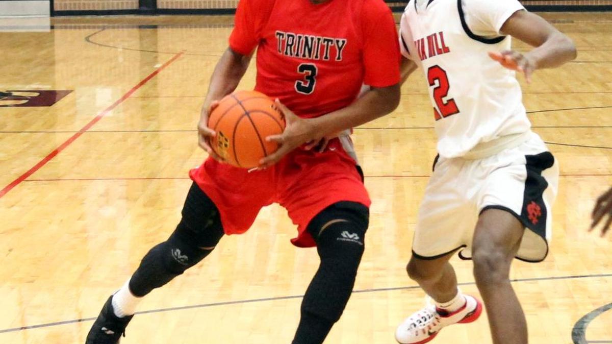 Jacob Jackson, left, and the Trojans are facing tough early-season competition.