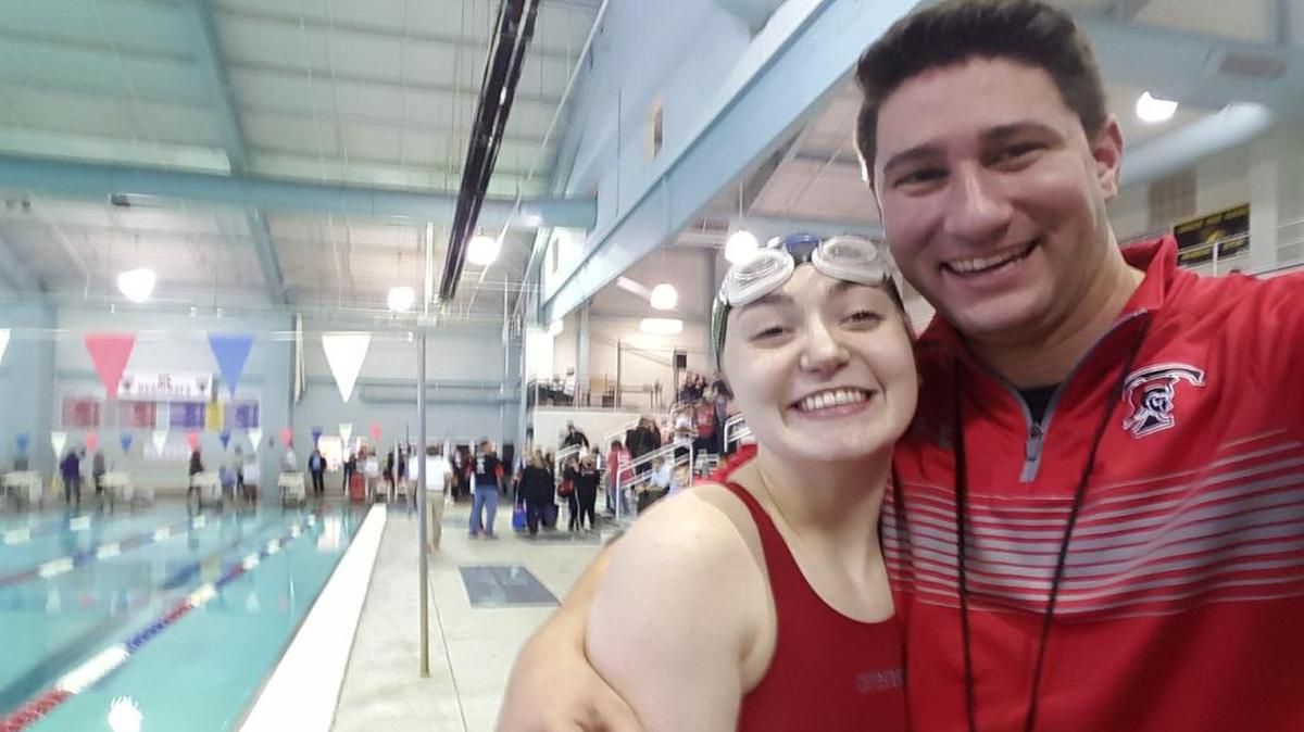 Trinity swimmer Kenzie Crews with coach Richard Campanaro.