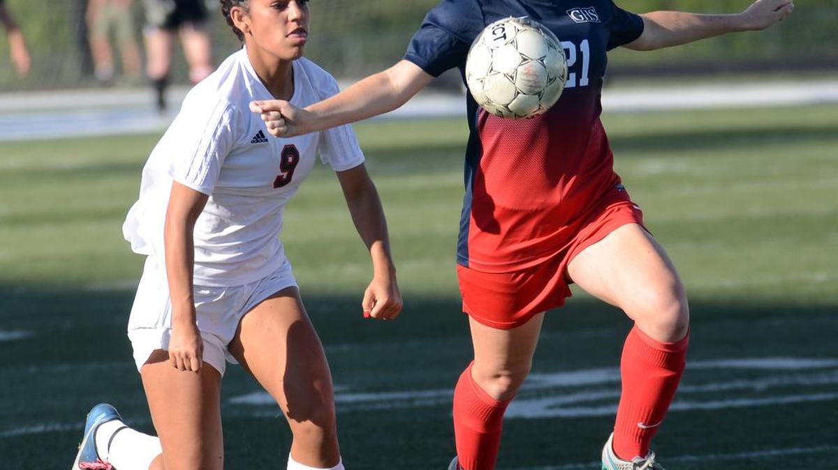 Grapevine's Sophia Smith, right, had a strong performance against Wichita Falls Rider.