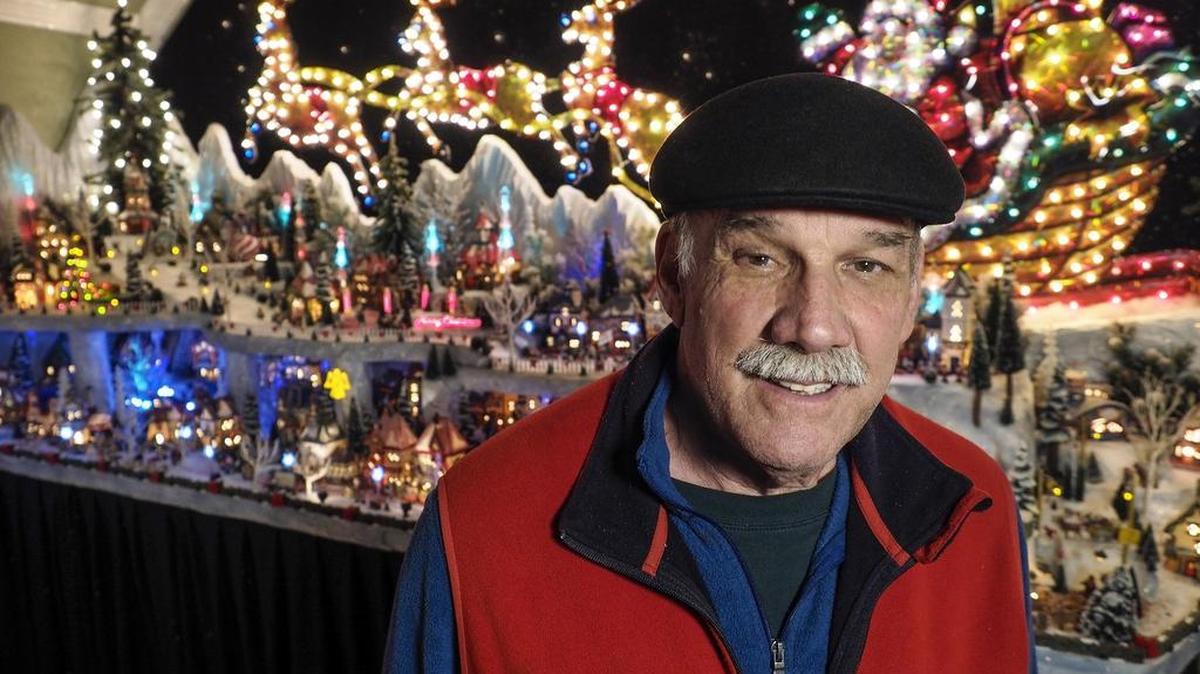 Ed Speakmon stands in the North Pole room of his Keller home.