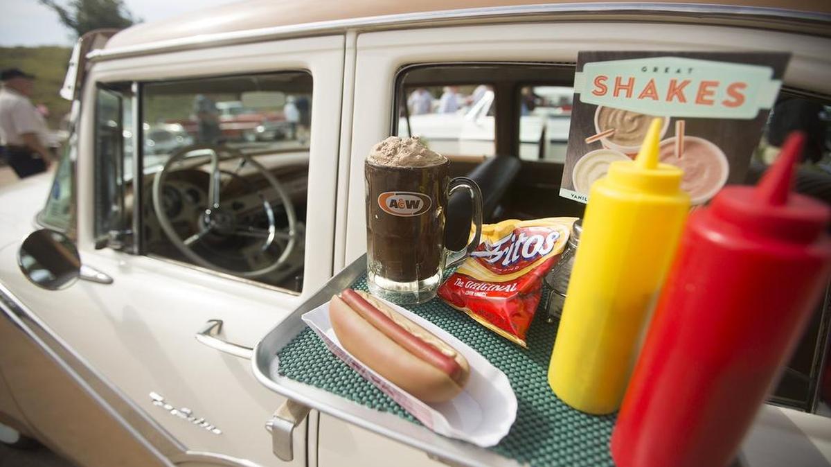 The drive-in restaurant look lives on at some retro local drive-ins. (Photo from a Westlake classic car show.)
