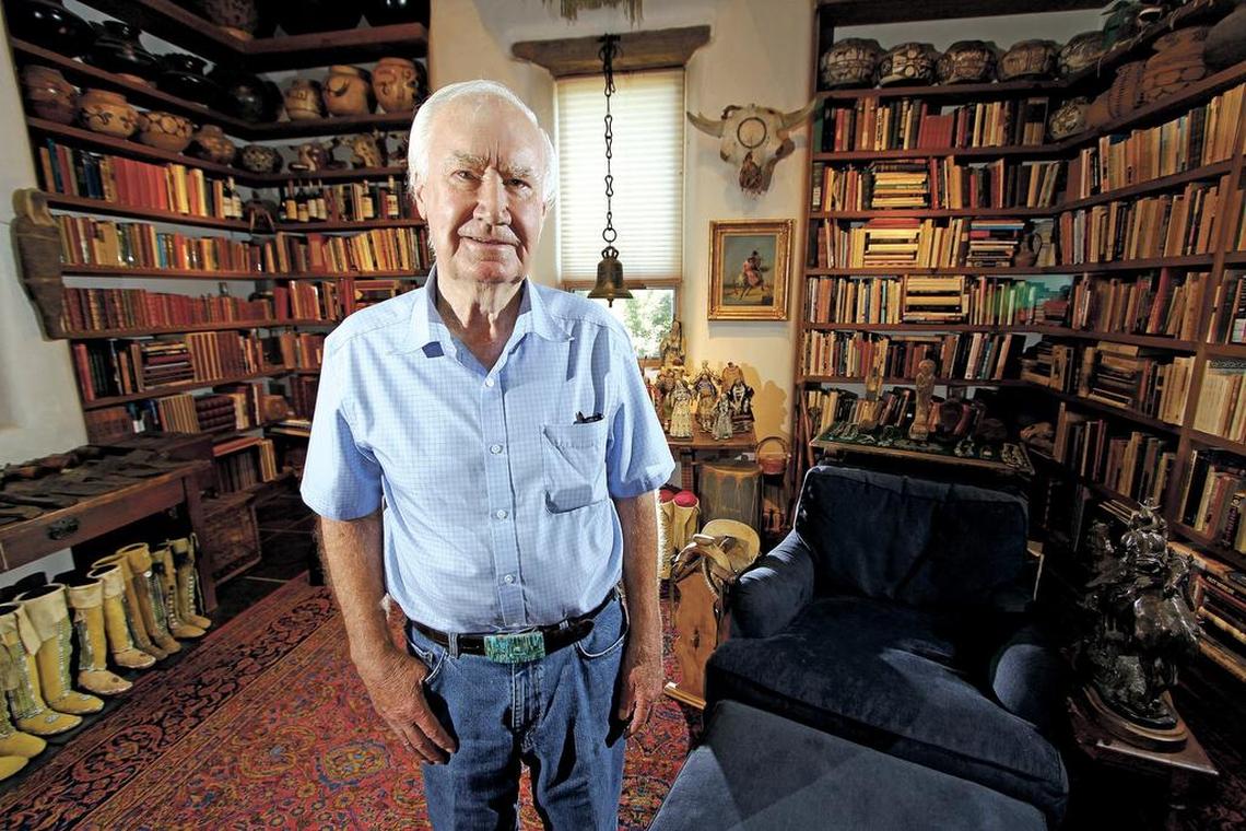 Author Forrest Fenn poses at his Santa Fe, N.M., home in this 2014 file photo. New Mexico's top law enforcement officer is asking Fenn, the author and antiquities dealer who inspired thousands to comb remote corners of the West in vain for a chest of gold and jewels, to end the treasure hunt.