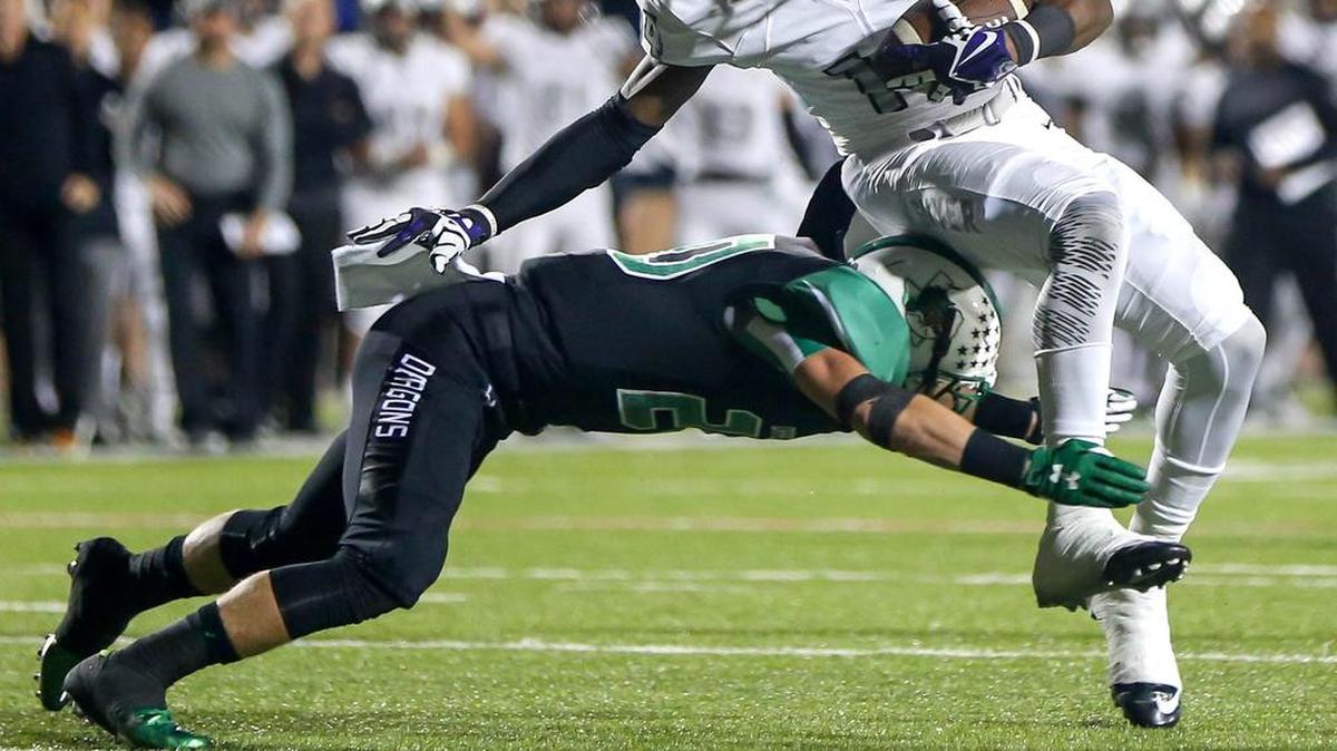Southlake Carroll’s Barrett Buck (tackling) could be used in many roles this fall.