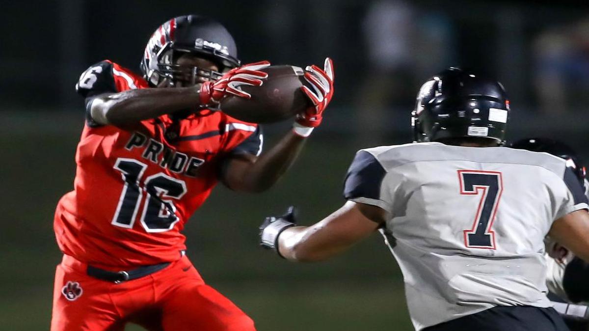 Colleyville Heritage WR Germon Thothion (16) comes up with a reception against Trinity last week.