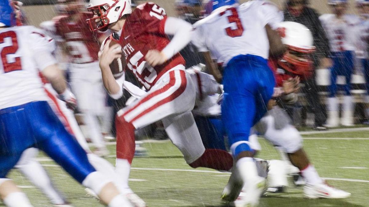 
Panthers junior Cam Roane, shown carrying the ball for his Grapevine Faith team last season, and senior Jacob Sheppard are the contenders for starting quarterback.
