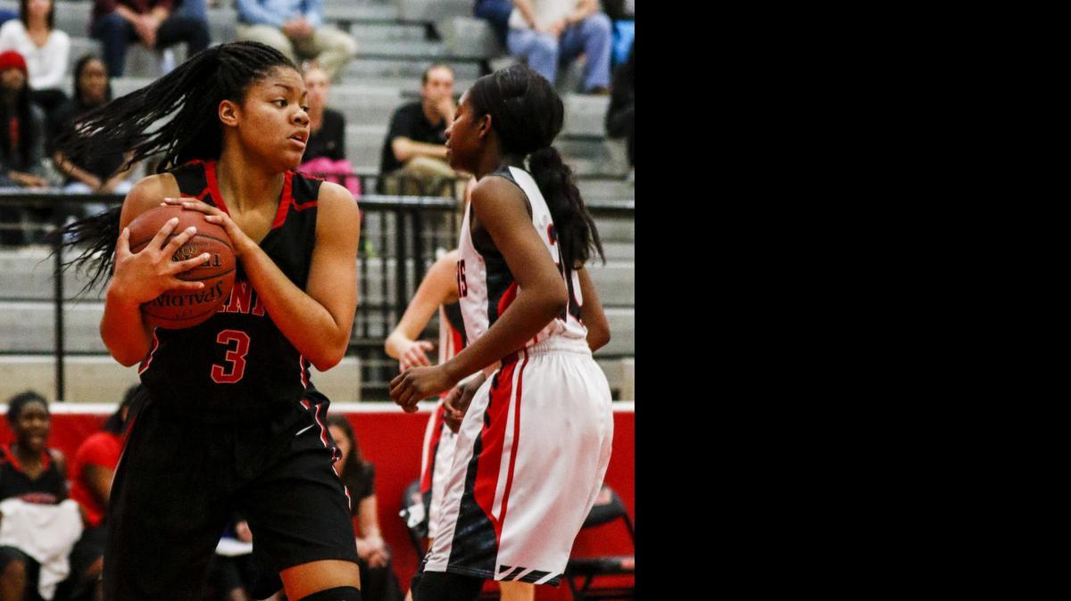 
The Lady Trojans’ Trinity Oliver, left, has been playing on a select team that includes L.D. Bell rival standout Lexi Gordon.
