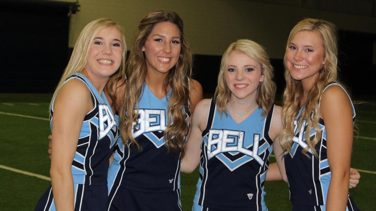 From left, Megan Dominiec, Reese Normand, Taelor Schmidt and Tara Yaeger are senior cheerleaders at L.D. Bell this year.