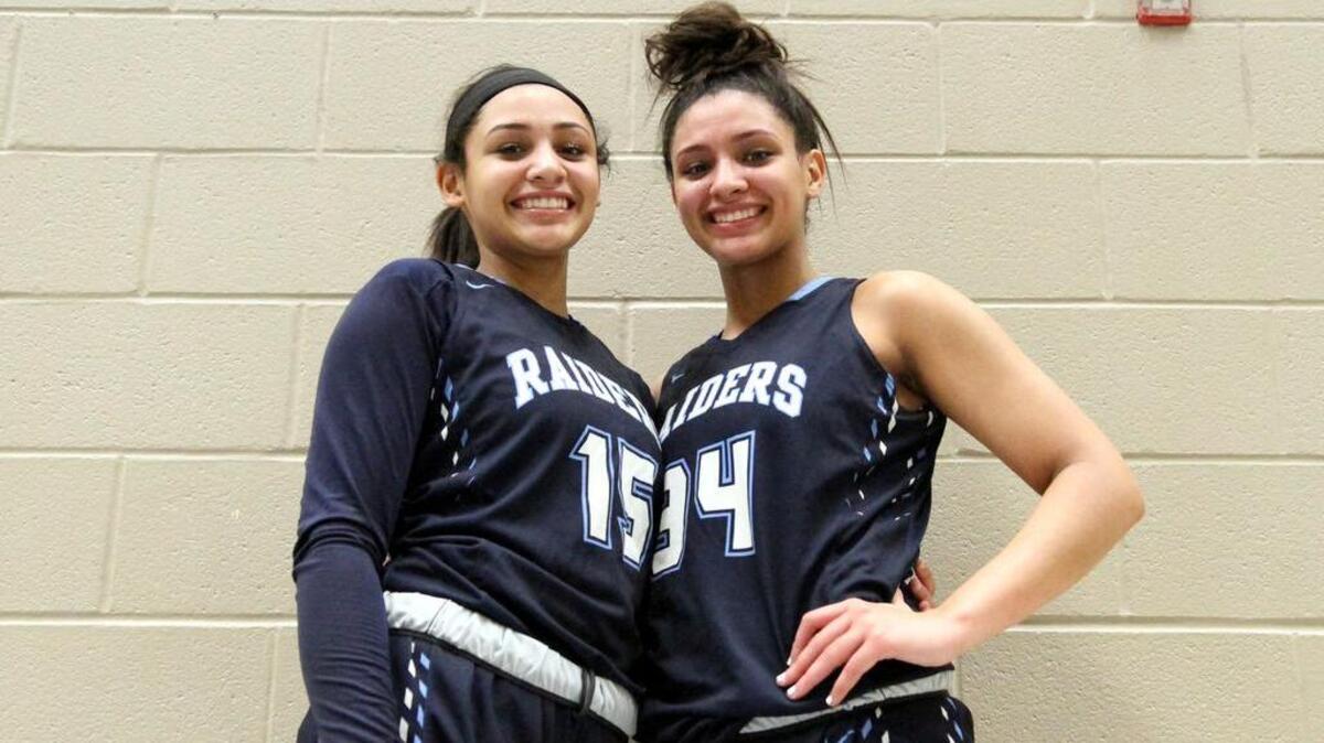 Myra, left, and Lexi Gordon are playing on the same high school basketball team for their first and only season.