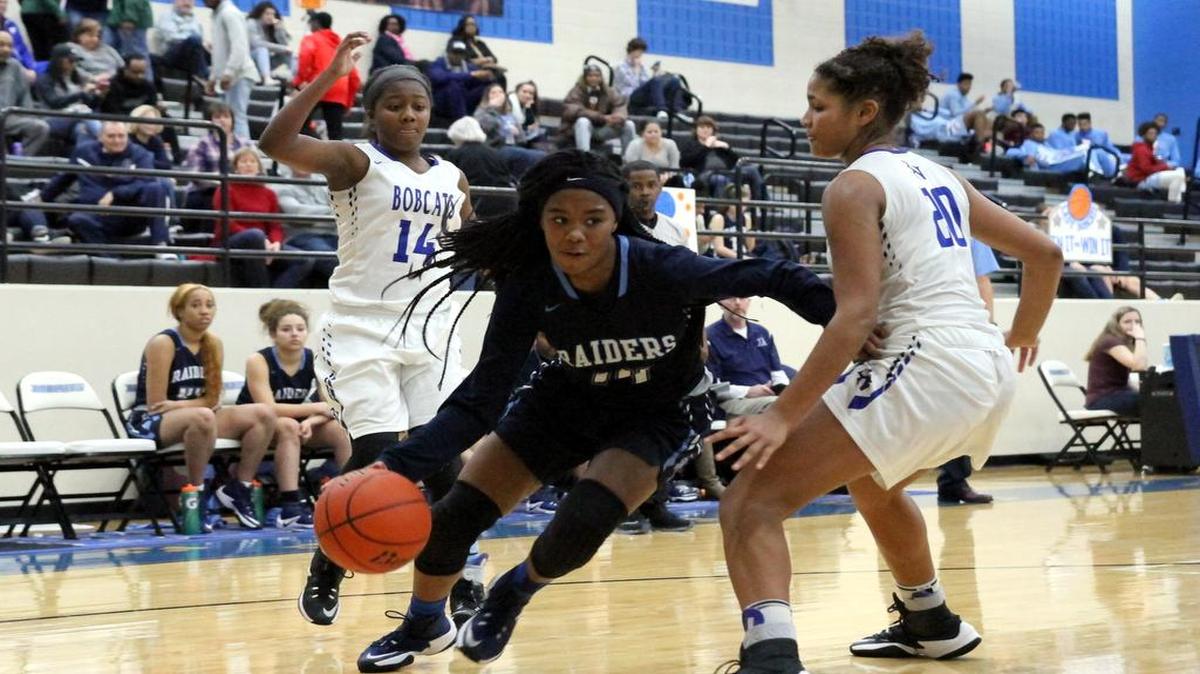 Playing challenging teams and tournaments has Bell players like freshman Kyla Davis (center) in playoff shape.