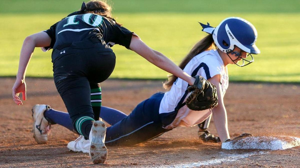 L.D. Bell’s Peyton Newman, right, led the team with 15 walks this season.