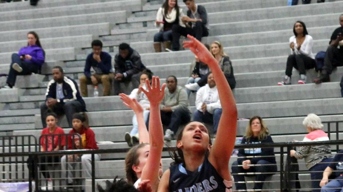 L.D. Bell will rely on standouts like Lexi Gordon (right) in a competitive District 7-6A.