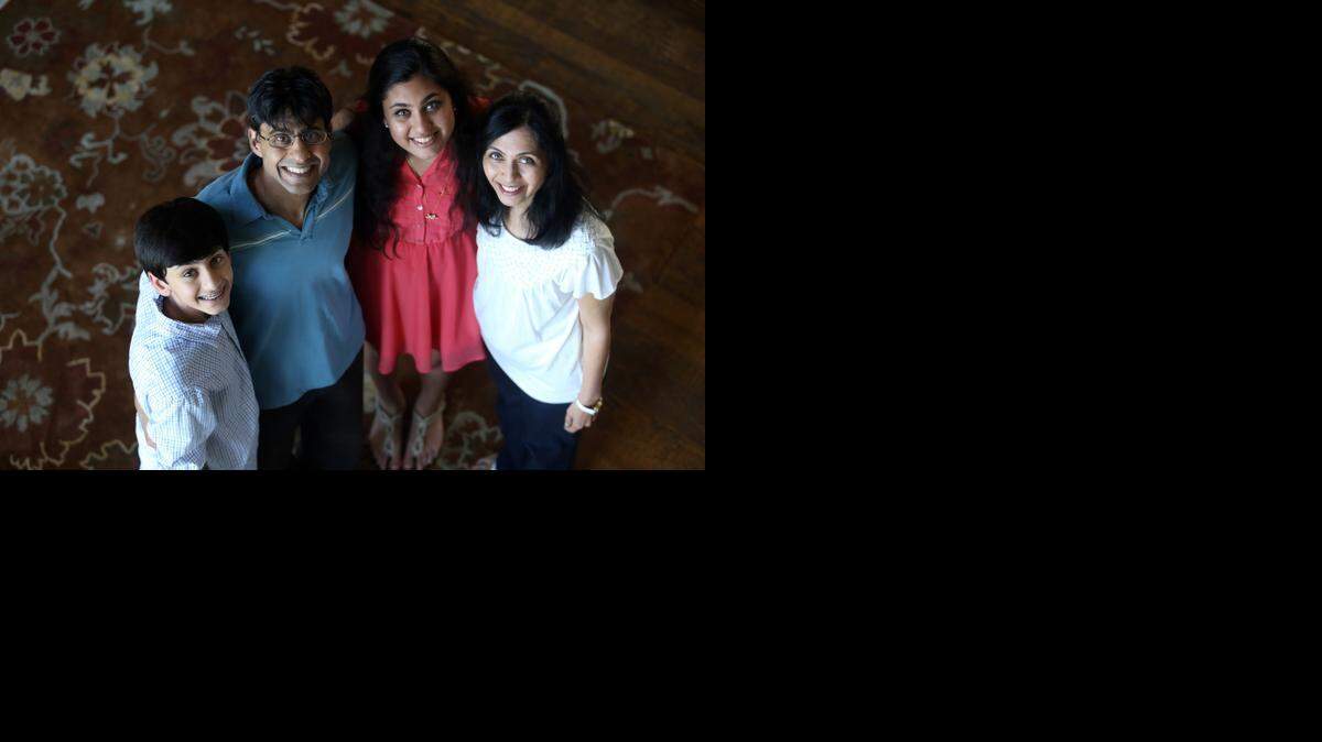 
The Shah family (left): Dilan, Urmesh,  Jaina and  Maitry in their Colleyville home. 

