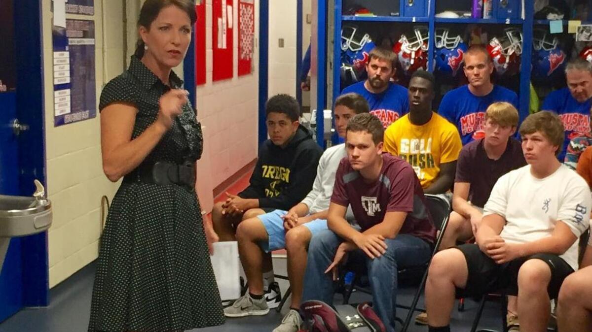 
Former WFAA-TV anchor/reporter Janet St. James talks at Grapevine High School about breast cancer awareness.
