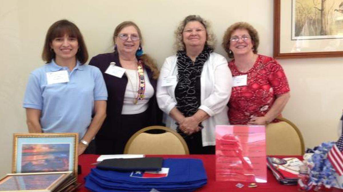 
From left, Judy E. Ramos, Rita Bryan, J.L. Rives and Jana Patton manage the Isaac Low chapter booth at the August Daughters of the Republic of Texas District II workshop in Fort Worth. 
